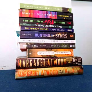 A stack of post apocalyptic canadian novels. 